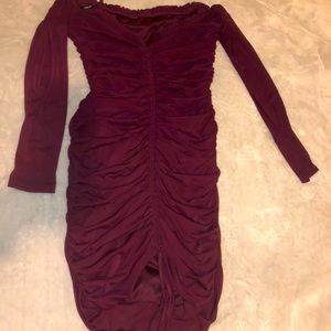 Ruched open shoulder dress.